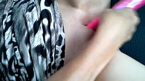 Blonde in car masturbates with sex toy