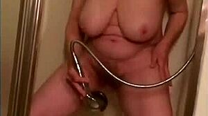 older woman masturbates to long orgasm in shower
