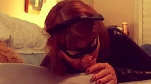 Hey, check out Catgranny blowing Batman in costume! 😺🦇