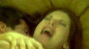 hot redhead rides cock in cowgirl and gets cumshot on sofa