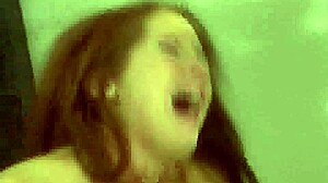 hot redhead rides cock in cowgirl and gets cumshot on sofa