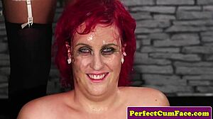 Busty ginger cocksucker gets bukake cum in interview