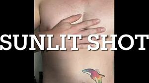 twink jerks off his big cock in sunlight