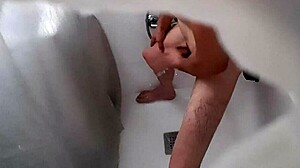 Hidden camera catches roommate pounding ass with a plunger in wild anal action.