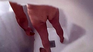 Hidden camera catches roommate pounding ass with a plunger in wild anal action.