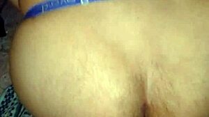 Riding thick dildo in close-up view with rough intensity