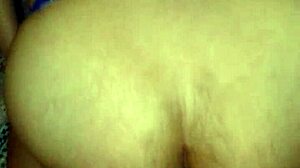 Riding thick dildo in close-up view with rough intensity