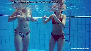 Marusia and Melisa Darkova dive into fierce underwater lesbian action.