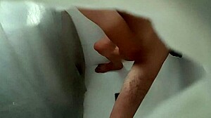 Hidden camera catches roommate pounding ass with a plunger in wild anal action.