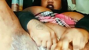 Watch the chubby queen creaming those big tits in gay action!