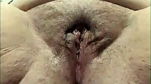 Check out this milf fingering her huge hairy pussy with dildo 😍