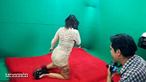 Dana poses in a photo session with a group of amateurs.