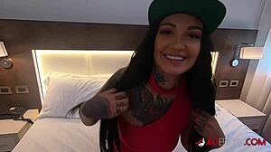 the tattooed bombshell adel asanti is sucking a big cock