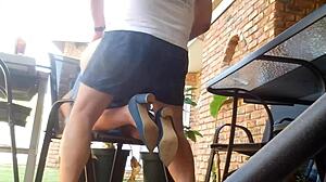 Stepmom in skirt outdoors with toys