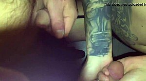 tattoed chick sucks stranger in video booth