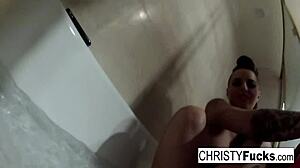 Sexy Christy Mack in makeup room bath, masturbating her big tits and ass.