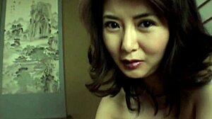 Does this japanese brunette love handjobs?