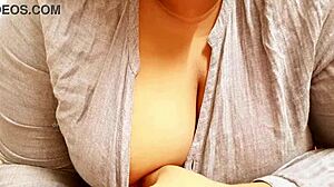 asian milf teases with big boobs in intriguing display