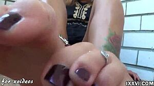 teen gives footjob and handjob to big dildo