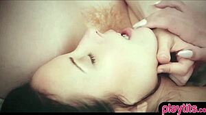 A real redhead teen engages in passionate lesbian sex with a brunette, exploring each other's bodies.