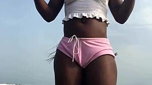 Watch crazybitch twerk on the beach?