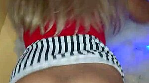 Beautiful crossdressing transsexual in makeup shows off