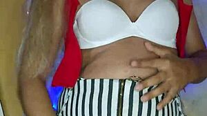 Beautiful crossdressing transsexual in makeup shows off