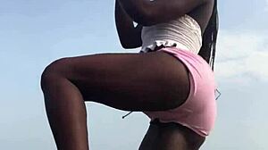 Watch crazybitch twerk on the beach?