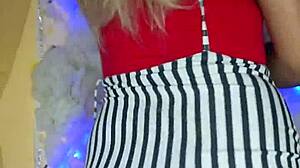 Beautiful crossdressing transsexual in makeup shows off