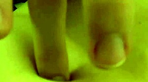 Fifi Foxx playing with belly button casually