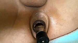 Close-Up View of Tunnel Anal Stretching with Vibrator Toys