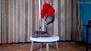 Look at that milf stripping in pantyhose and heels at the table!