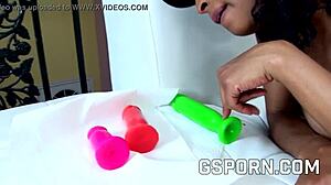 Ebony lesbians plug asses and fuck