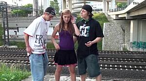 she's in the public street getting banged in a group orgy.