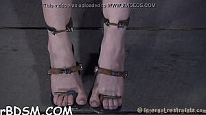 Why is this beauty tied upside down with snatch thrashed?