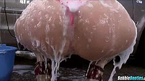 Soapy bubble butt babe washes car