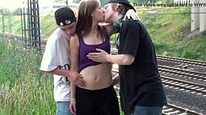 she's in the public street getting banged in a group orgy.