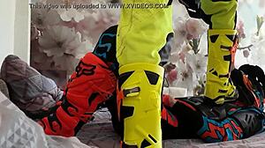 Gay motocross riders tread in boots