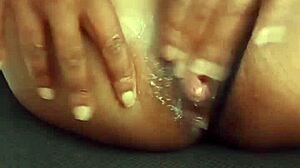 milf fingers herself quietly in the office.