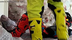 Gay motocross riders tread in boots