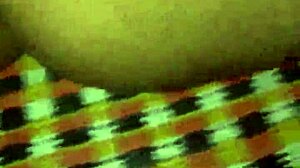 Young couple shares a passionate kiss while sleeping