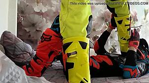 Gay motocross riders tread in boots