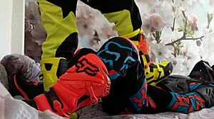 Gay motocross riders tread in boots