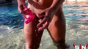 avery jane enjoys a swim in the pool