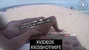 Kriss hotwife encounters two strangers on the beach during masturbation.