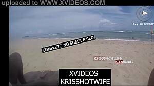 Kriss hotwife encounters two strangers on the beach during masturbation.