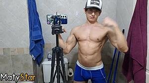 video preview of flexing muscles and cumming