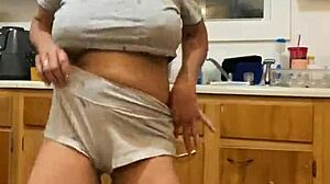 Anna Maria says, 'Watch me dance while doing dishes, part two.'