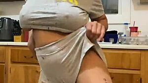 Anna Maria says, 'Watch me dance while doing dishes, part two.'