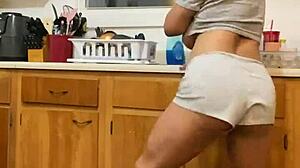 Anna Maria says, 'Watch me dance while doing dishes, part two.'